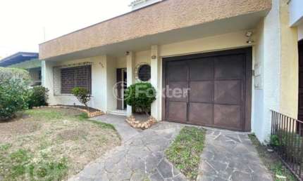 Casa com 3 quartos à venda na Rua Márcio Dias, 530, Nonoai, Porto Alegre, 120 m2 por R$ 520.000