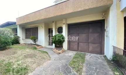Casa com 3 quartos à venda na Rua Márcio Dias, 530, Nonoai, Porto Alegre, 120 m2 por R$ 520.000