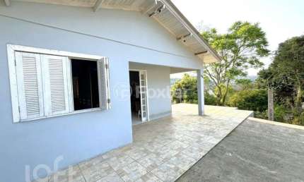 Casa com 3 quartos à venda na Rua das Aroeiras, 330, Roselândia, Novo Hamburgo, 152 m2 por R$ 332.000