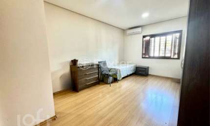 Casa com 4 quartos à venda na Rua País de Gales, 740, Marechal Rondon, Canoas, 274 m2 por R$ 1.390.000