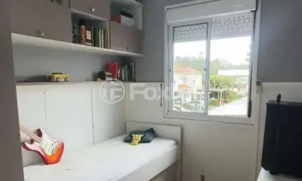 Casa em condomínio fechado com 3 quartos à venda na Rua Aurora, 1200, Marechal Rondon, Canoas, 144 m2 por R$ 848.000