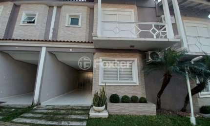 Casa em condomínio fechado com 3 quartos à venda na Rua Tenente Antônio João, 845, Estância Velha, Canoas, 143 m2 por R$ 700.000