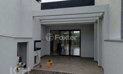 Casa com 3 quartos à venda na Rua Antônio Ramos, 675, Loteamento Jardim Timbaúva, Gravataí, 154 m2 por R$ 930.000