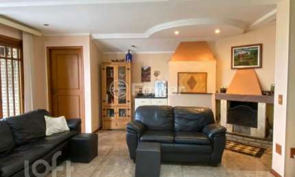 Casa com 3 quartos à venda na Rua Alcebíades Antônio dos Santos, 107, Nonoai, Porto Alegre, 423 m2 por R$ 990.000