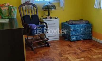 Casa com 4 quartos à venda na Avenida Antônio Carvalho, 1391, Jardim Carvalho, Porto Alegre, 217 m2 por R$ 550.000