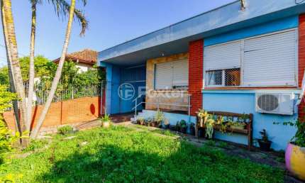 Casa com 3 quartos à venda na Rua General Solon, 255, Jardim Itu Sabará, Porto Alegre, 266 m2 por R$ 700.000