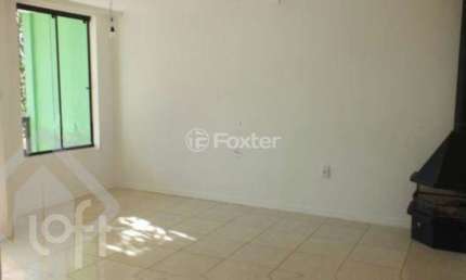 Casa em condomínio fechado com 3 quartos à venda na Avenida Vicente Monteggia, 1669, Cavalhada, Porto Alegre, 208 m2 por R$ 580.000
