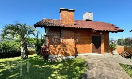 Casa com 4 quartos à venda na Rua Guaporé, 79, Primavera, Novo Hamburgo, 304 m2 por R$ 1.099.000