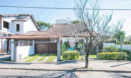 Casa com 4 quartos à venda na Rua Marquês do Maricá, 341, Vila Nova, Porto Alegre, 255 m2 por R$ 950.000