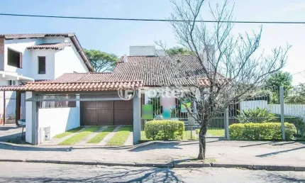 Casa com 4 quartos à venda na Rua Marquês do Maricá, 341, Vila Nova, Porto Alegre, 255 m2 por R$ 950.000