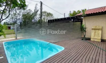 Casa com 5 quartos à venda na Rua Argentina, 557, Zona Norte, Capão da Canoa, 190 m2 por R$ 600.000