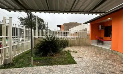Casa com 2 quartos à venda na Rua Guarás, 112, Jardim Algarve, Alvorada, 175 m2 por R$ 297.000