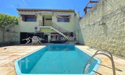 Casa com 4 quartos à venda na Rua São Sebastião do Cai, 50, Camaquã, Porto Alegre, 235 m2 por R$ 749.000