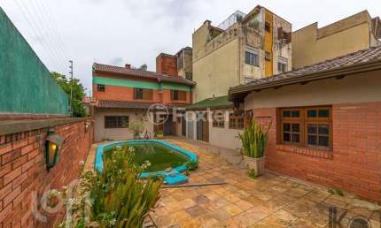 Casa com 6 quartos à venda na Rua Santa Flora, 882, Nonoai, Porto Alegre, 239 m2 por R$ 810.000