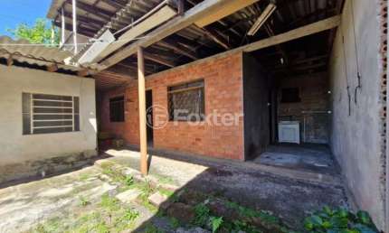 Casa com 2 quartos à venda na Avenida Esperança, 640, Guajuviras, Canoas, 177 m2 por R$ 320.000