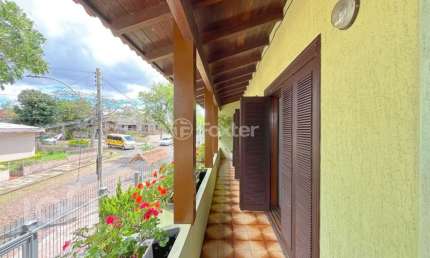 Casa com 4 quartos à venda na Rua Professor José Maria Rodrigues, 58, Vila Ipiranga, Porto Alegre, 302 m2 por R$ 1.140.000
