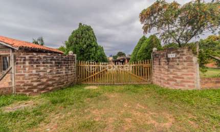 Casa em condomínio fechado com 3 quartos à venda na Rua Aragua, 140, Águas Claras, Viamão, 250 m2 por R$ 390.000