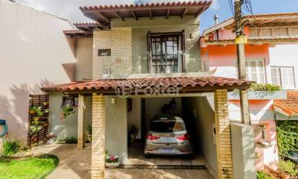 Casa em condomínio fechado com 3 quartos à venda na Rua Erechim, 100, Nonoai, Porto Alegre, 187 m2 por R$ 750.000