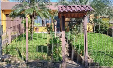 Casa com 3 quartos à venda na Rua Marquês do Maricá, 135, Vila Nova, Porto Alegre, 127 m2 por R$ 712.500