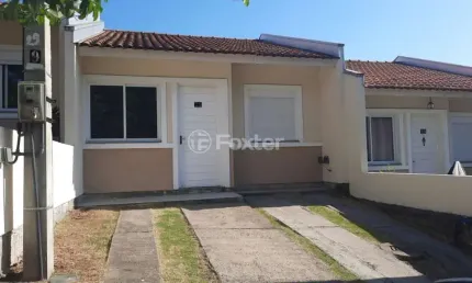 Casa em condomínio fechado com 2 quartos à venda na Rua Oscar Schick, 2350, Formoza, Alvorada, 66 m2 por R$ 259.000