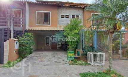 Casa em condomínio fechado com 3 quartos à venda na Rua Pau-Brasil, 581, Hípica, Porto Alegre, 142 m2 por R$ 580.000