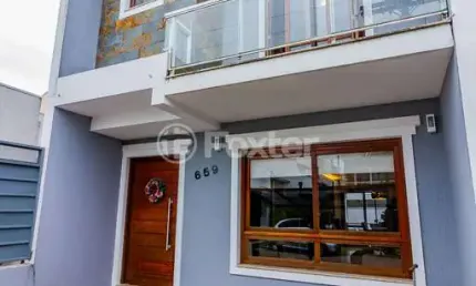 Casa em condomínio fechado com 3 quartos à venda na Rua Pau-Brasil, 659, Hípica, Porto Alegre, 133 m2 por R$ 599.000