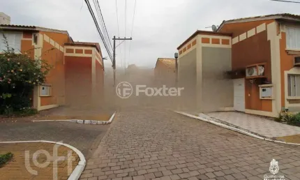 Casa em condomínio fechado com 2 quartos à venda na Rua Tenente Ary Tarrago, 1720, Jardim Itu Sabará, Porto Alegre, 84 m2 por R$ 340.000