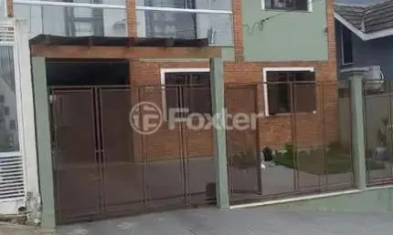 Casa em condomínio fechado com 3 quartos à venda na Rua Madre Celina Maria Azambuja, 100, Mário Quintana, Porto Alegre, 368 m2 por R$ 830.000