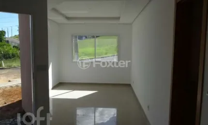 Casa com 3 quartos à venda na Rua Madre Celina Maria Azambuja, 170, Mário Quintana, Porto Alegre, 112 m2 por R$ 530.000