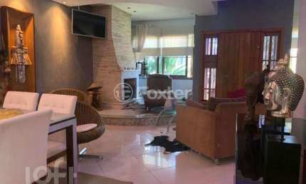 Casa com 4 quartos à venda na Rua São Sebastião do Cai, 11, Camaquã, Porto Alegre, 330 m2 por R$ 1.650.000