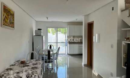 Casa com 3 quartos à venda na Rua Vanderlei da Silva Alves, 470, Mário Quintana, Porto Alegre, 104 m2 por R$ 550.000