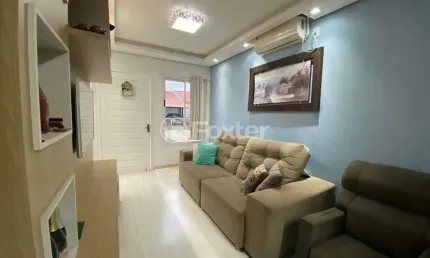 Casa em condomínio fechado com 2 quartos à venda na Rua Santa Eulália, 57, Olaria, Canoas, 57 m2 por R$ 325.000
