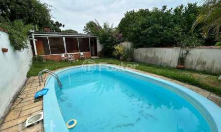 Casa com 3 quartos à venda na Rua Humberto de Campos, 237, Partenon, Porto Alegre, 150 m2 por R$ 600.000