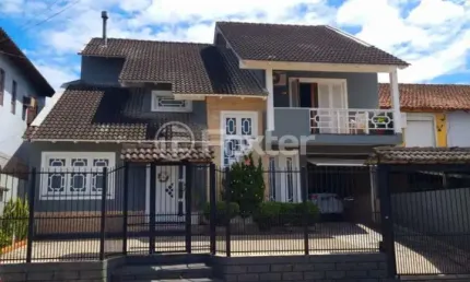 Casa com 3 quartos à venda na Rua Itaqui, 408, Parque da Matriz, Cachoeirinha, 248 m2 por R$ 780.000