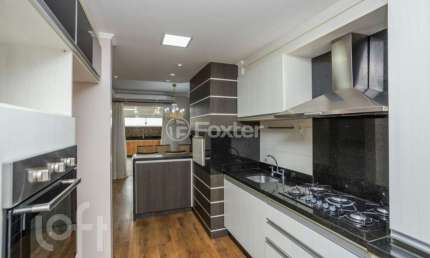 Casa em condomínio fechado com 3 quartos à venda na Avenida Açucena, 550, Estância Velha, Canoas, 189 m2 por R$ 1.100.000