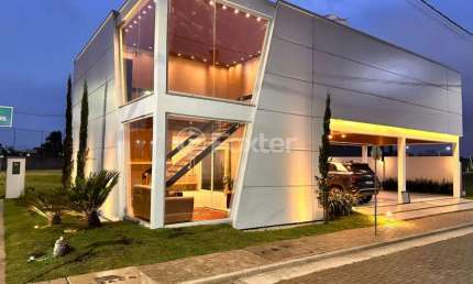 Casa em condomínio fechado com 3 quartos à venda na Avenida Frederico Warstat, 695, Sans Souci, Eldorado do Sul, 235 m2 por R$ 1.480.000
