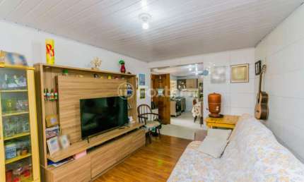 Casa com 2 quartos à venda na Rua Nilo Torres, 146, Coronel Aparício Borges, Porto Alegre, 100 m2 por R$ 218.500