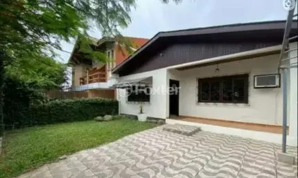 Casa com 3 quartos à venda na Rua Jacipuia, 278, Guarujá, Porto Alegre, 177 m2 por R$ 650.000
