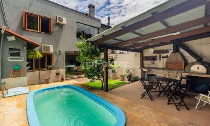 Casa em condomínio fechado com 4 quartos à venda na Rua Adriano Pereira da Silva, 311, Vila Nova, Porto Alegre, 243 m2 por R$ 1.235.000