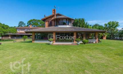 Casa com 5 quartos à venda na Rua dos Pescadores, 4600, Arquipélago, Porto Alegre, 450 m2 por R$ 5.989.000