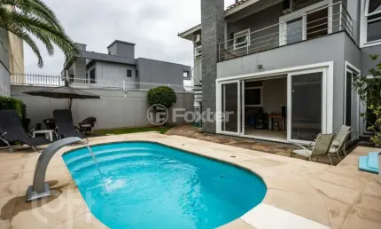 Casa com 4 quartos à venda na Rua Bélgica, 76, Marechal Rondon, Canoas, 221 m2 por R$ 1.999.000