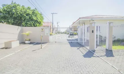 Casa em condomínio fechado com 2 quartos à venda na Rua Treze de Maio, 630, Rio Branco, Canoas, 103 m2 por R$ 350.000