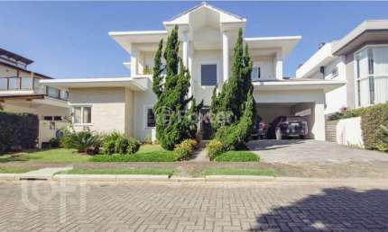 Casa em condomínio fechado com 4 quartos à venda na Rodovia Doutor Antônio Luiz Moura Gonzaga, 3825, Rio Tavares, Florianópolis, 328 m2 por R$ 4.999.000