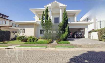Casa em condomínio fechado com 4 quartos à venda na Rodovia Doutor Antônio Luiz Moura Gonzaga, 3825, Rio Tavares, Florianópolis, 328 m2 por R$ 4.999.000