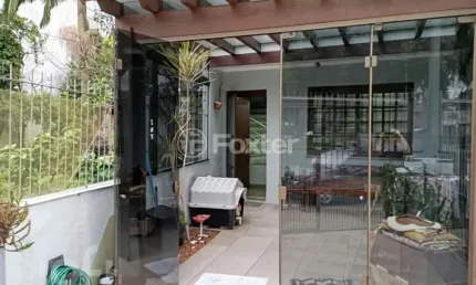 Casa com 3 quartos à venda na Praça Breno Caldas, 242, Jardim Itu Sabará, Porto Alegre, 144 m2 por R$ 680.000