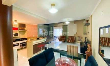 Casa com 4 quartos à venda na Rua Bélgica, 199, Marechal Rondon, Canoas, 180 m2 por R$ 979.900