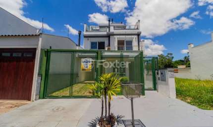 Casa com 3 quartos à venda na Rua Ivo Walter Kern, 650, Hípica, Porto Alegre, 178 m2 por R$ 1.062.000