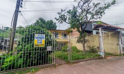 Casa com 3 quartos à venda na Avenida Bento Gonçalves, 7076, Partenon, Porto Alegre, 420 m2 por R$ 550.000