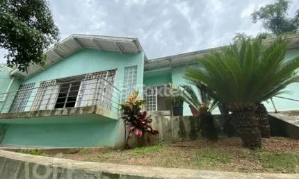 Casa com 3 quartos à venda na Rua Luiz de Camões, 719, Vila Nova, Novo Hamburgo, 212 m2 por R$ 480.000
