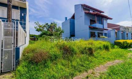 Terreno em condomínio fechado à venda na Rua Claudio da Silva Pinto, 422, Guarujá, Porto Alegre, 300 m2 por R$ 237.000